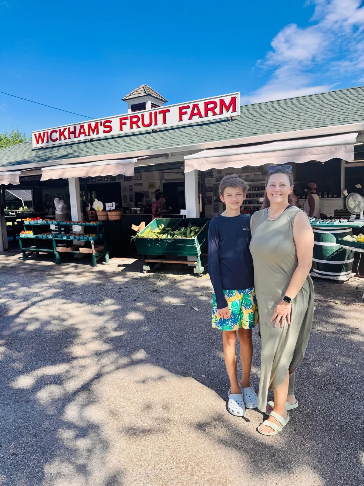 Heather and her son at a Long Island farm stand
